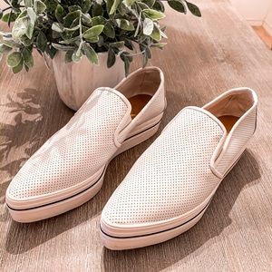 White pointed toe sneakers